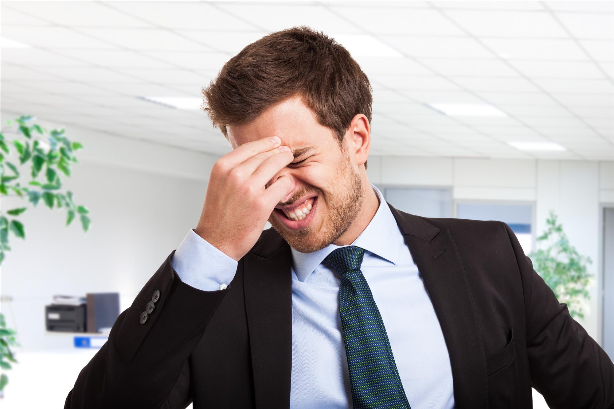 Man having a Reputation Crisis in an office