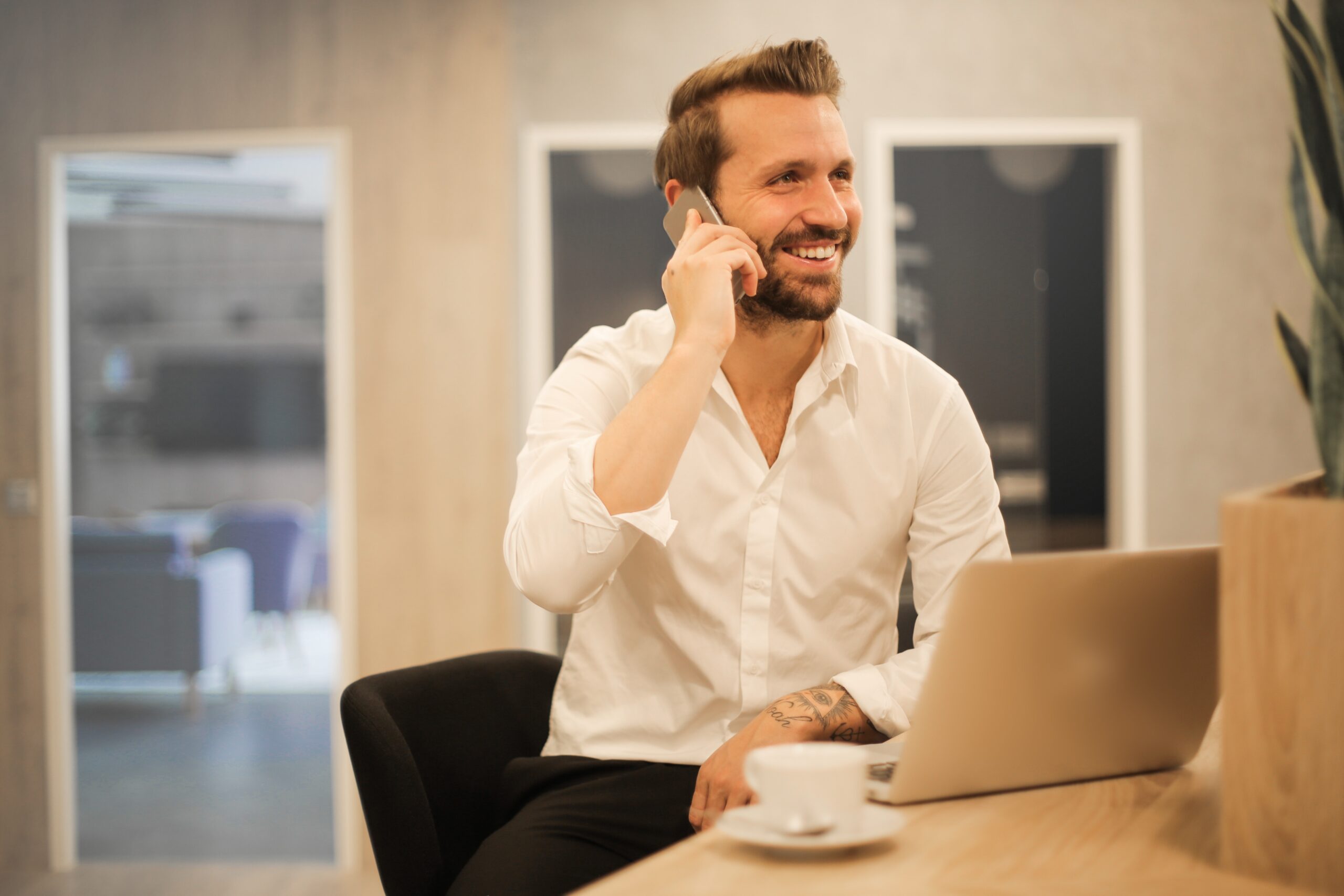 Man Using Cell Phone for a Call Center