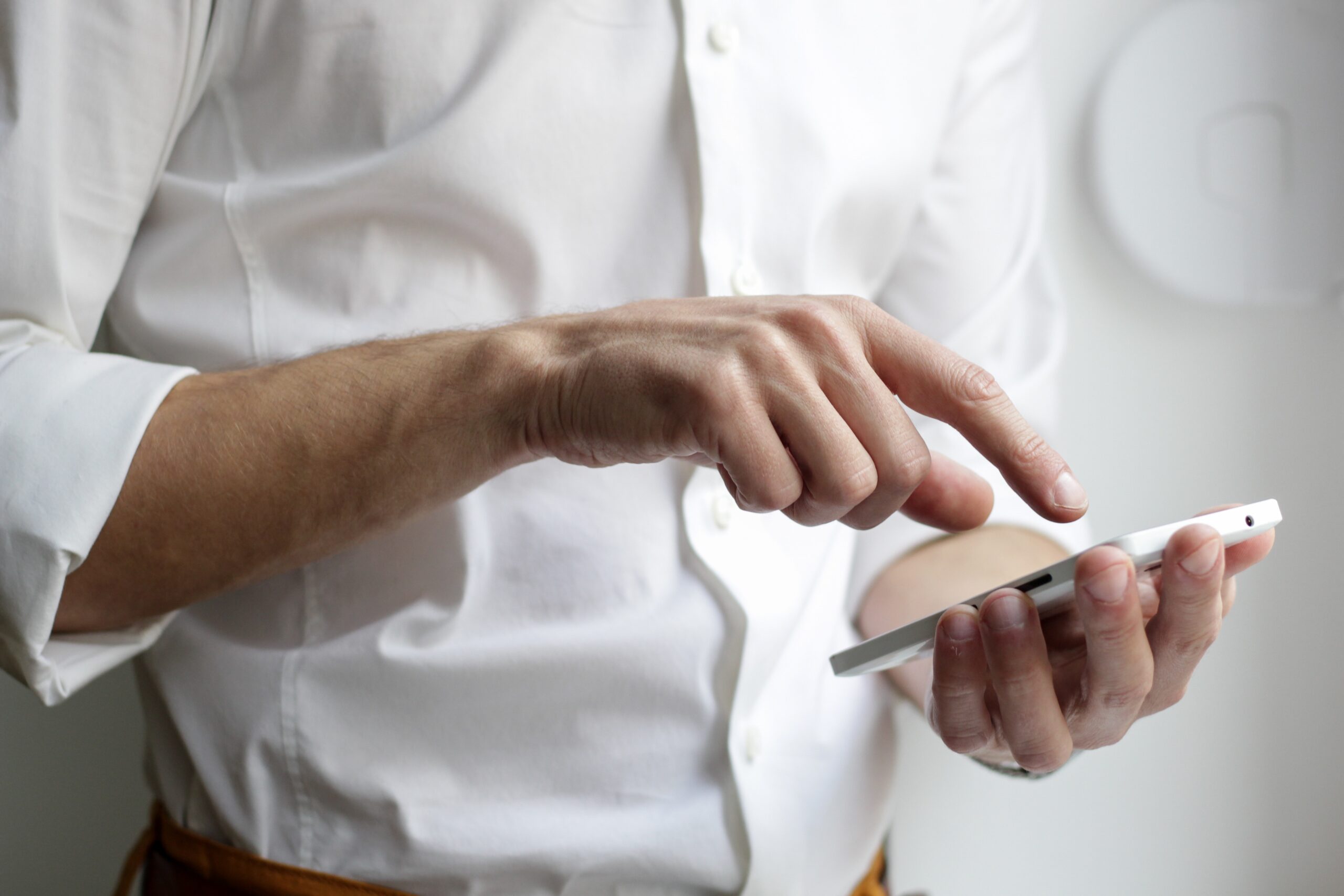 Live Receptionist Services, man on cell phone