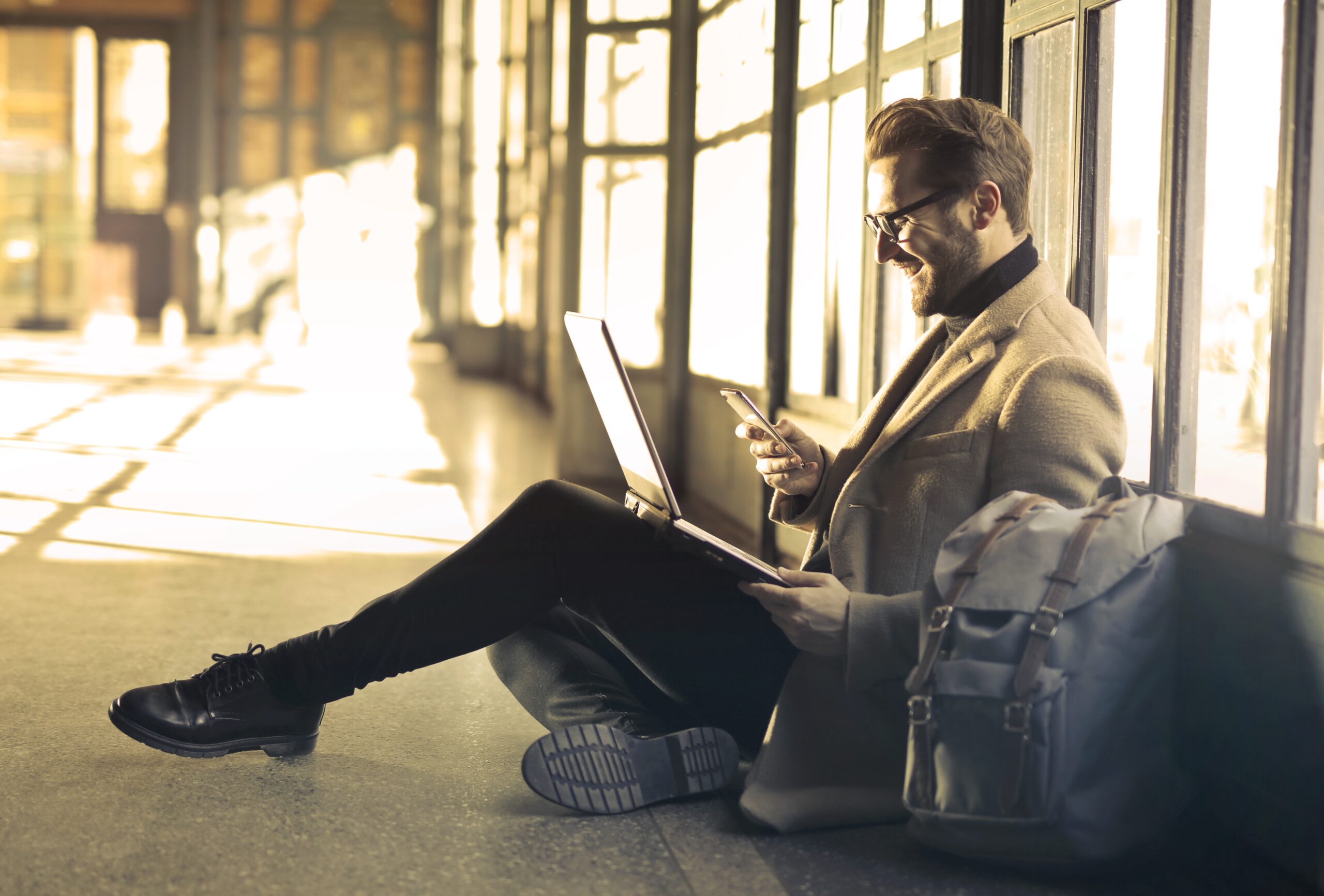 man in a suit on the phone for answering services