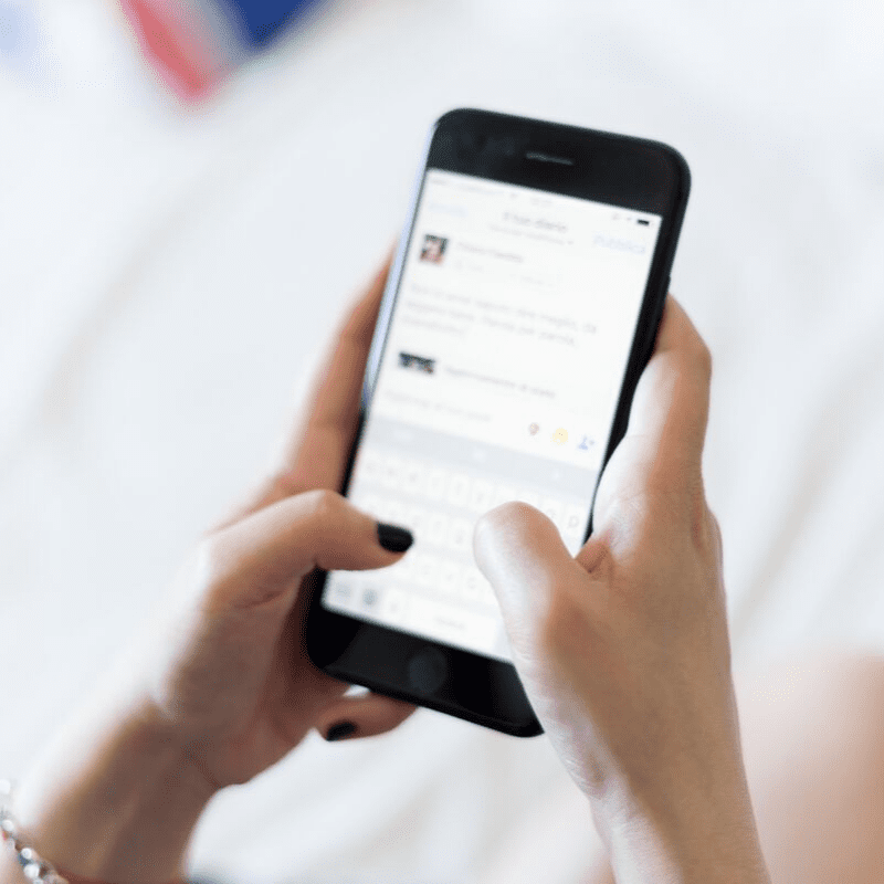 Woman doing Event Registration on a cell phone
