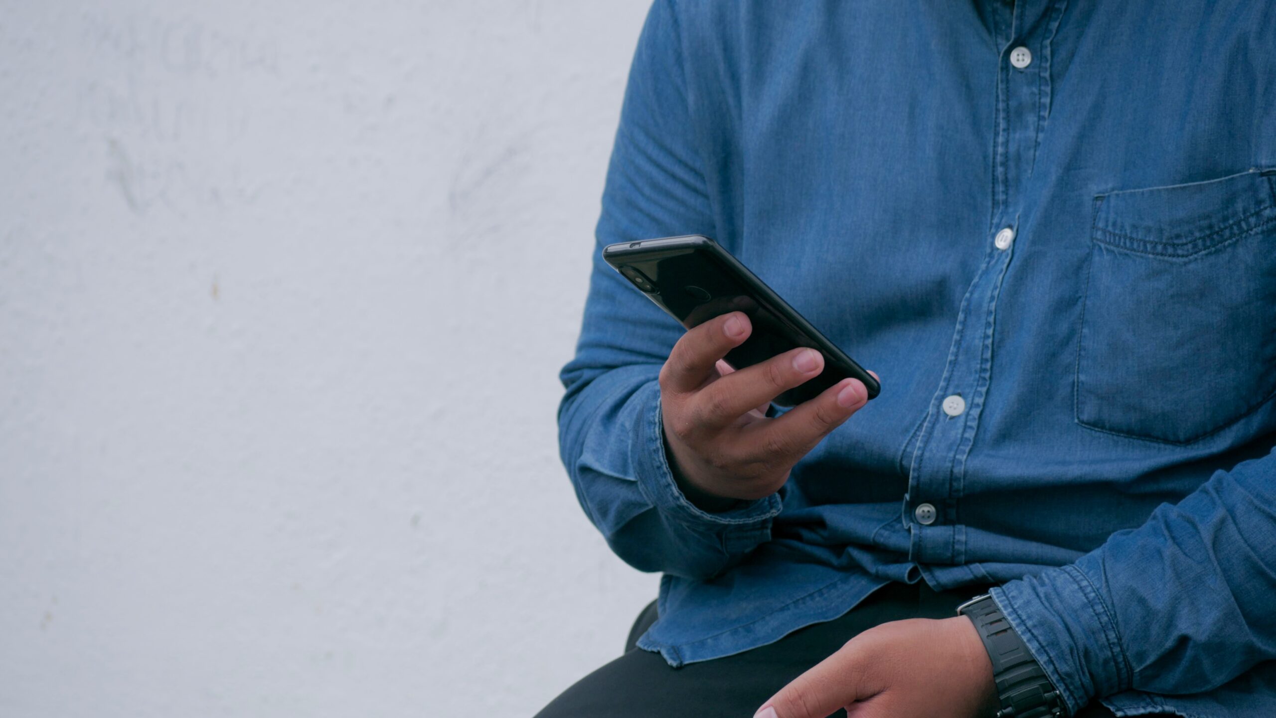 Man in technology industry on the phone with virtual receptionist