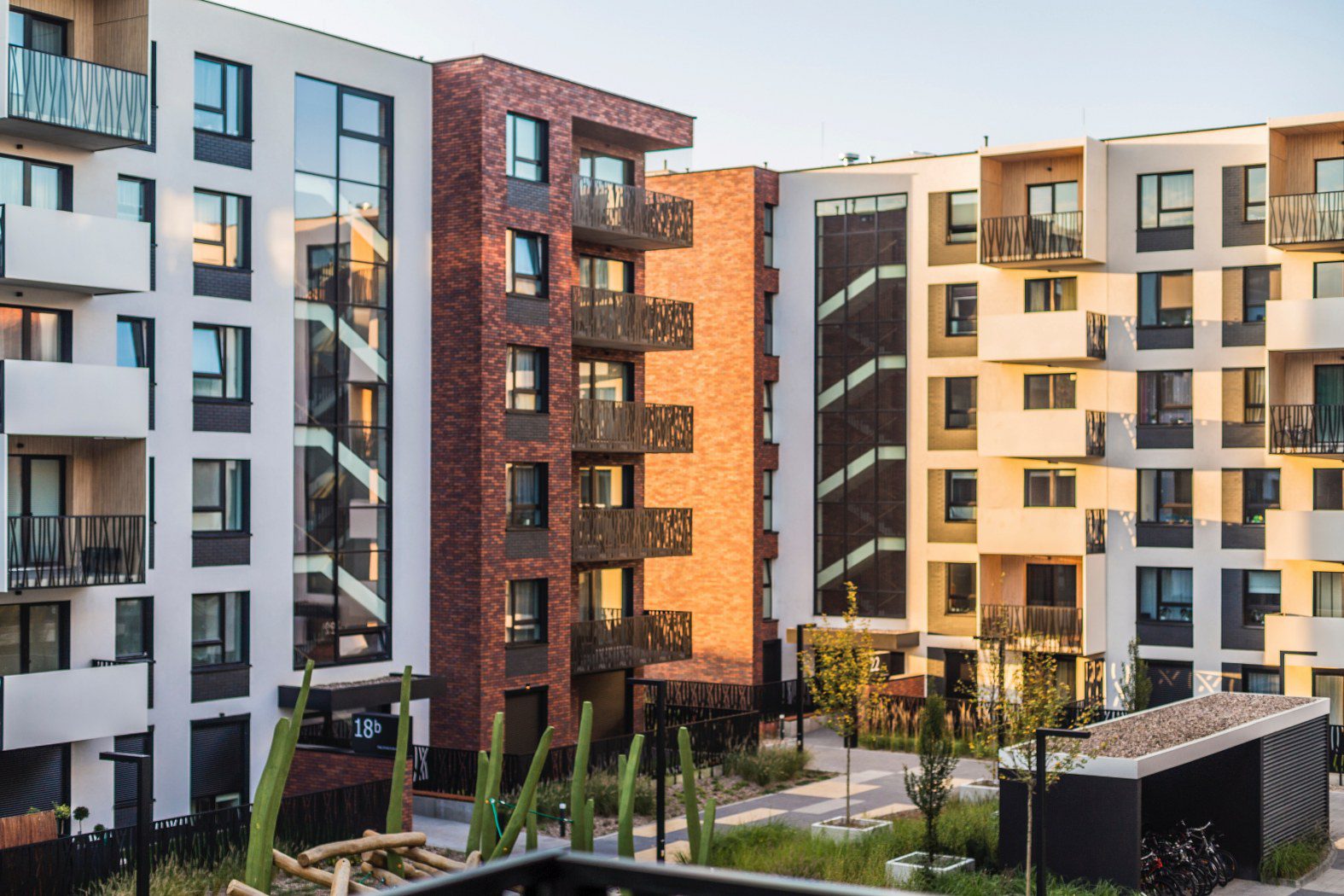 image of apartment building that would require the help of an answering service for property management