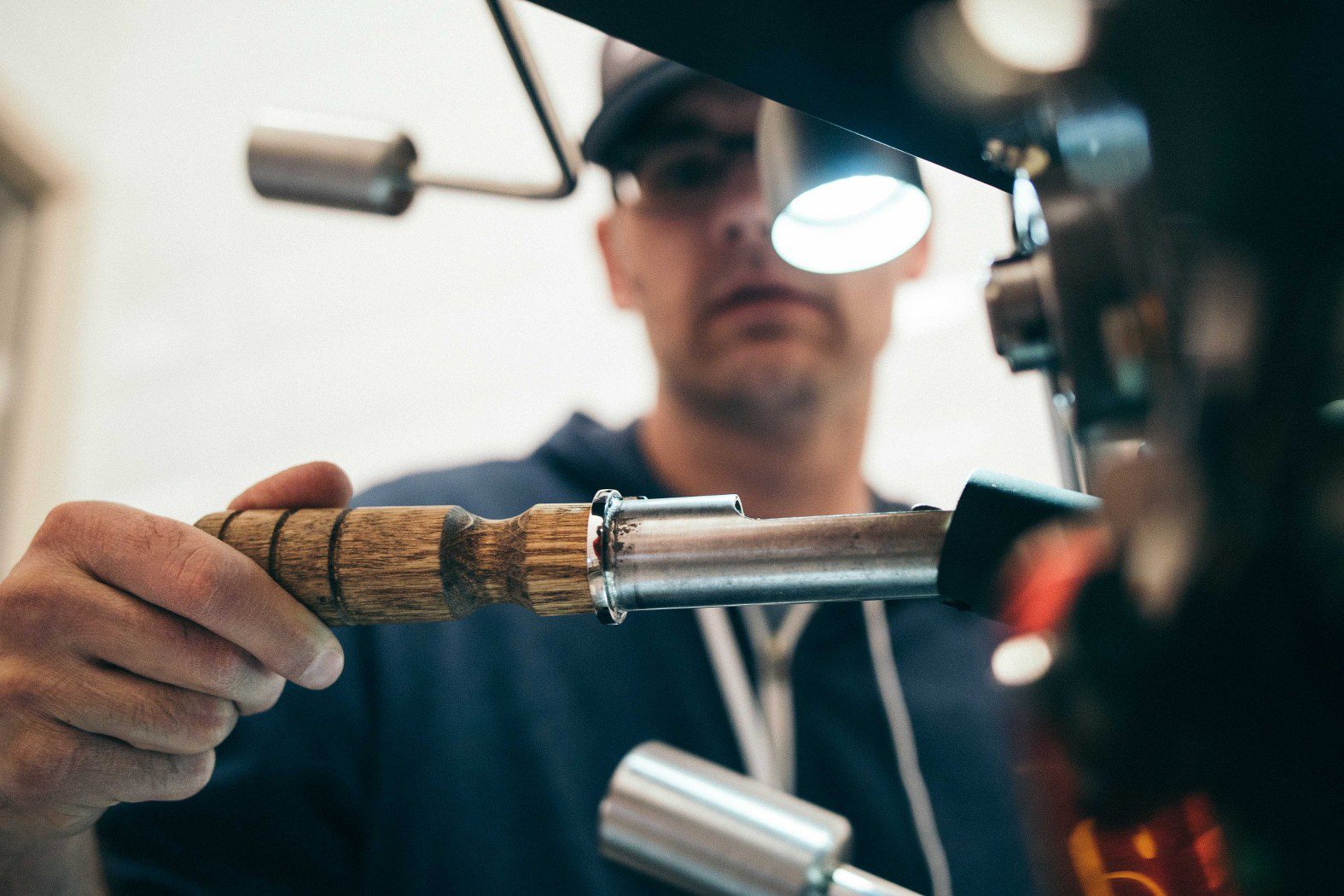 Image of a plumber able to concentrate on what he's doing because he's hired an Answering Service for Plumbers