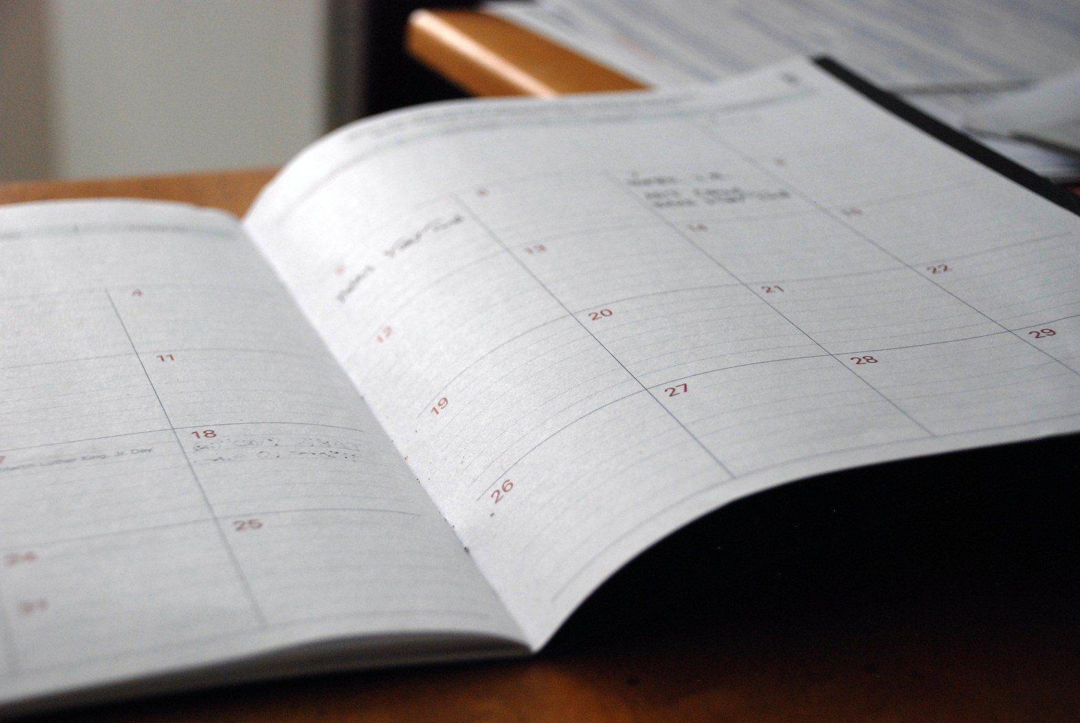 image of a scheduling book representing appointment setting services for easier booking