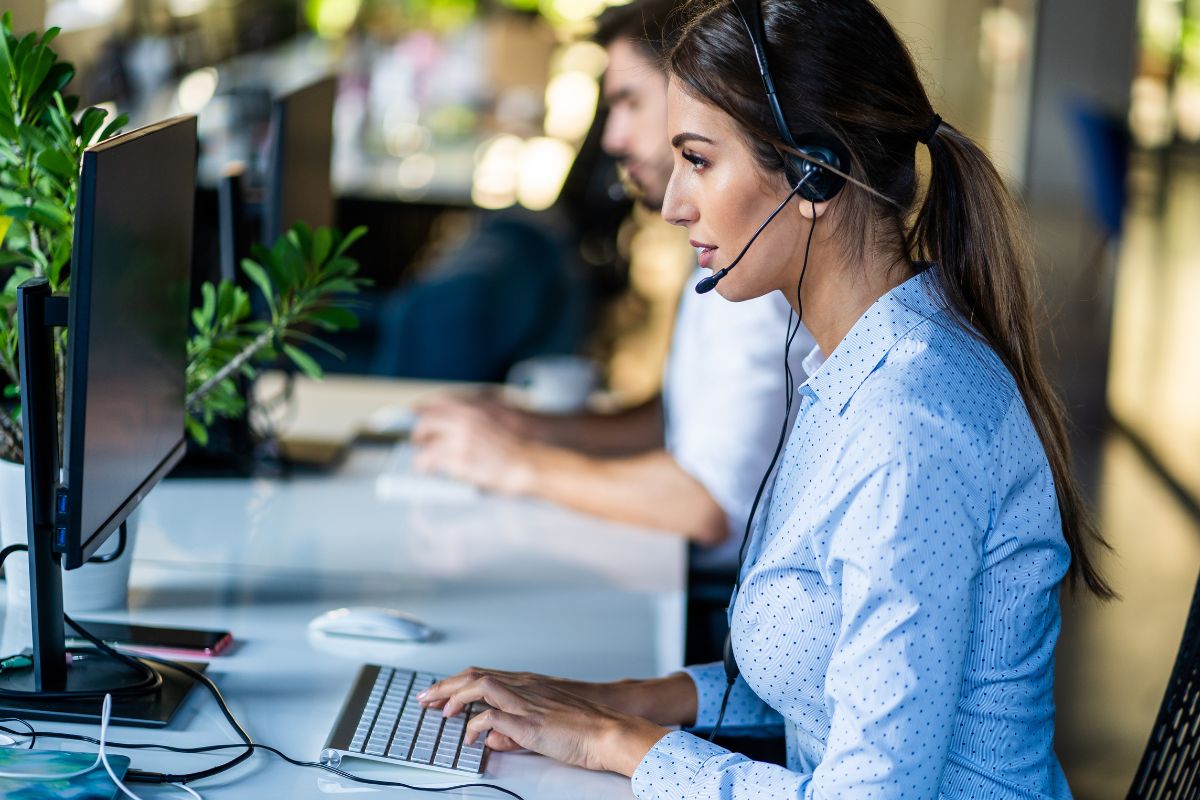 woman cc agent on call - call center for property management